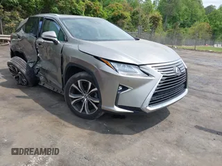 2018 Lexus RX 350L Premium z VIN JTJGZKCA1J2002511, wystawiony jako IAAI lot #42090972 z przebiegiem 218 782 mil mil oraz . Historia ofert i sprzedaży dostępna na DreamBid. Obrazek 1.