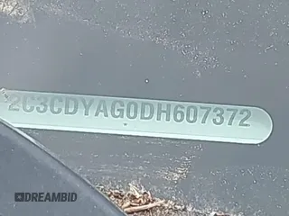 2013 Dodge Challenger SXT с VIN 2C3CDYAG0DH607372, выставлен на аукционе IAAI как лот 42819112 с пробегом 223 376 миль миль и . История ставок и продаж доступна на DreamBid. Изображение 9.