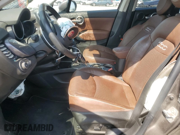 2017 FIAT 500X Lounge with VIN ZFBCFXDB7HP518161, listed as a Copart auction lot 60134985 with 51,357 mi miles and Salvage title. Bid and sale history available at DreamBid. Image 7.