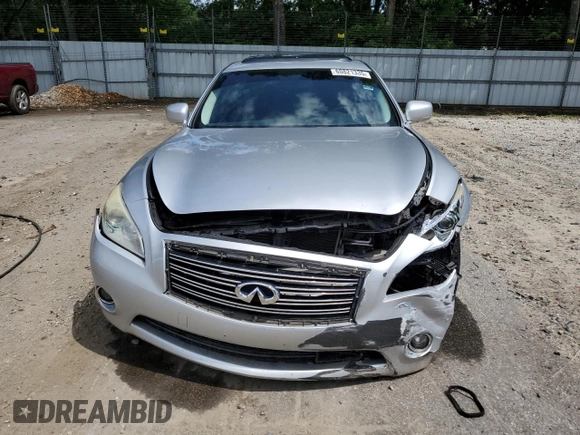 2012 Infiniti M Hybrid with VIN JN1EY1AP0CM910697, listed as a Copart auction lot 60821335 with 145,533 mi miles and Salvage title. Bid and sale history available at DreamBid. Image 5.