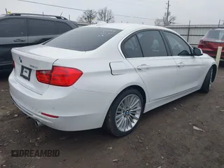 2014 BMW 3 Series 335i with VIN WBA3A9G50ENS65136, listed as a IAAI auction lot 41504021 with 60,892 mi miles. Bid and sale history available at carsss.com. Image 4.