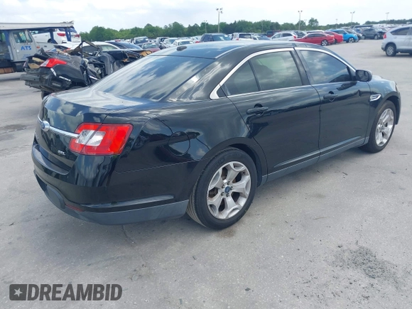 2012 Ford Taurus SEL with VIN 1FAHP2EW8CG113879, listed as a IAAI auction lot 42004495 with 194,952 mi miles and . Bid and sale history available at DreamBid. Image 4.