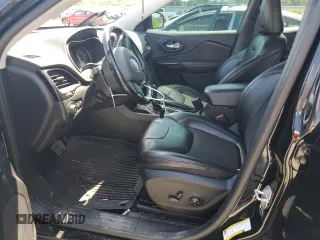 2021 Jeep Cherokee Altitude with VIN 1C4PJLLBXMD144549, listed as a Copart auction lot 62163435 with 94,571 mi miles and Salvage title. Bid and sale history available at DreamBid. Image 7.