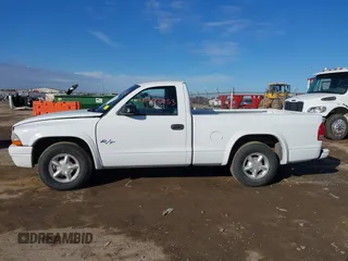 2000 Dodge Dakota SLT with VIN 1B7GL26Z7YS708253, listed as a IAAI auction lot 41402953 with 103,461 mi miles and . Bid and sale history available at DreamBid. Image 14.
