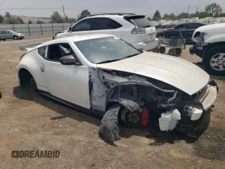 2014 Nissan 370Z with VIN JN1AZ4EH2EM631397, listed as a Copart auction lot 65758844 with 0 mi miles and Salvage Title. Bid and sale history available at carsss.com. Image 4.