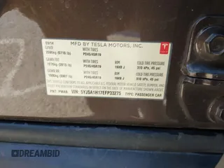2014 Tesla Model S 60 with VIN 5YJSA1H17EFP33275, listed as a IAAI auction lot 41778167 with 202,749 mi miles and . Bid and sale history available at DreamBid. Image 9.