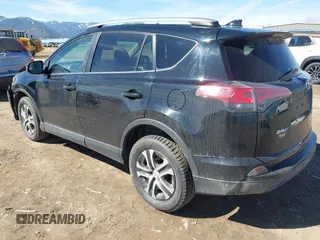 2017 Toyota RAV4 LE with VIN 2T3BFREV2HW543163, listed as a IAAI auction lot 41875755 with 96,398 mi miles and . Bid and sale history available at carsss.com. Image 3.
