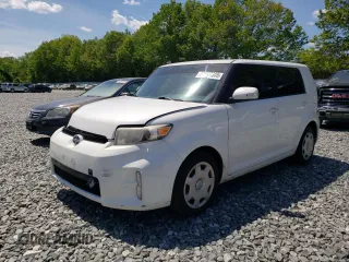 2014 Scion xB z VIN JTLZE4FE9EJ064207, wystawiony jako Copart lot #58377305 z przebiegiem 164 574 mil mil oraz Tytuł czysty. Historia ofert i sprzedaży dostępna na DreamBid. Obrazek 1.