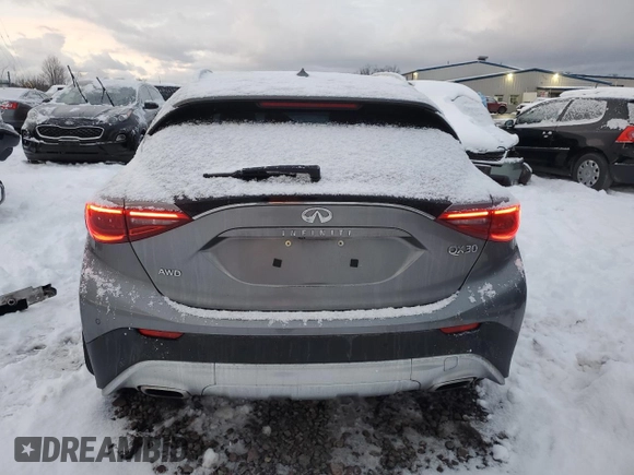 2017 Infiniti QX30 Premium with VIN SJKCH5CRXHA027612, listed as a Copart auction lot 82098974 with 85,004 mi miles and Non repairable. Bid and sale history available at DreamBid. Image 6.