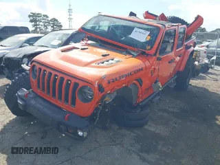 2020 Jeep Gladiator Rubicon с VIN 1C6JJTBG0LL164890, выставлен на аукционе IAAI как лот 41795545 с пробегом 77 860 миль миль и . История ставок и продаж доступна на DreamBid. Изображение 2.