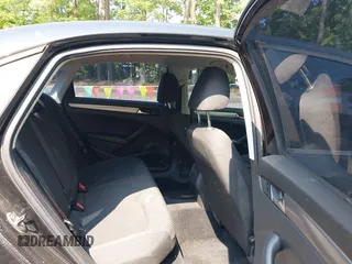 2014 Volkswagen Passat Wolfsburg Edition with VIN 1VWAT7A35EC056127, listed as a IAAI auction lot 42497467 with 111,443 mi miles and . Bid and sale history available at DreamBid. Image 8.