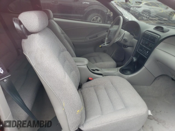 1997 Ford Mustang with VIN 1FALP4040VF166533, listed as a Copart auction lot 66524354 with 71,082 mi miles and Salvage Title. Bid and sale history available at carsss.com. Image 7.