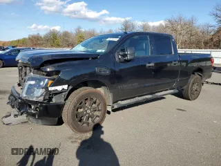 2019 Nissan Titan XD SV with VIN 1N6BA1F48KN517118, listed as a Copart auction lot 80270374 with 103,021 mi miles and Salvage Title. Bid and sale history available at carsss.com. Image 1.