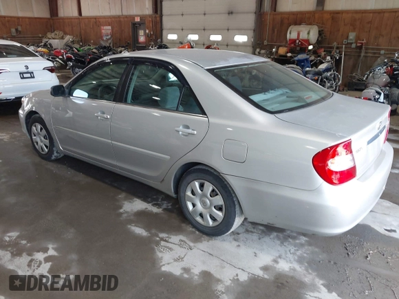 2004 Toyota Camry LE with VIN 4T1BE32K64U327071, listed as a IAAI auction lot 42438458 with 194,614 mi miles and . Bid and sale history available at DreamBid. Image 3.