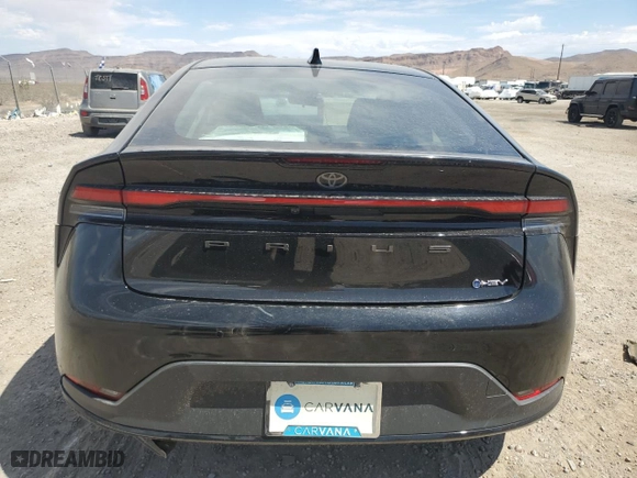 2023 Toyota Prius LE with VIN JTDACAAU0P3002651, listed as a Copart auction lot 69497884 with 21,593 mi miles and Salvage Title. Bid and sale history available at carsss.com. Image 6.