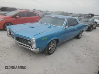 1967 Pontiac GTO z VIN 242177Z109196, wystawiony jako Copart lot #74348844 z przebiegiem Nie podano mil oraz Szkoda całkowita • Salvage title. Historia ofert i sprzedaży dostępna na DreamBid. Obrazek 1.