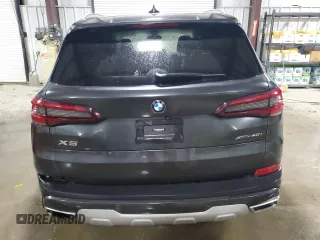 2020 BMW X5 xDrive40i with VIN 5UXCR6C09L9C51165, listed as a Copart auction lot 58212555 with Not provided miles and Salvage title. Bid and sale history available at DreamBid. Image 6.
