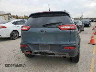 2015 Jeep Cherokee Trailhawk with VIN 1C4PJMBS0FW578199, listed as a Copart auction lot 77538544 with 122,444 mi miles and Salvage Title. Bid and sale history available at carsss.com. Image 6.