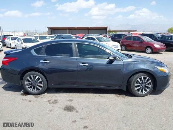 2016 Nissan Altima 2.5 S with VIN 1N4AL3AP8GC133418, listed as a IAAI auction lot 41932707 with 104,830 mi miles. Bid and sale history available at carsss.com. Image 13.