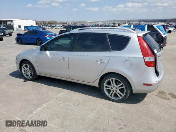 2012 Hyundai Elantra Touring SE with VIN KMHDC8AE6CU147482, listed as a Copart auction lot 48552545 with 142,384 mi miles and Salvage Title. Bid and sale history available at carsss.com. Image 2.
