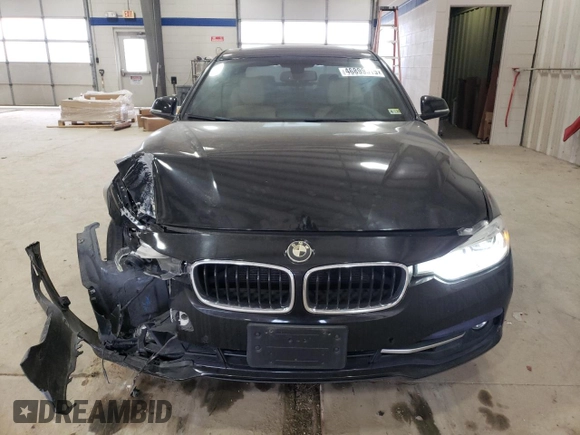 2017 BMW 3 Series 330i xDrive with VIN WBA8D9G30HNU65773, listed as a Copart auction lot 46899315 with 76,949 mi miles and Salvage Title. Bid and sale history available at carsss.com. Image 5.