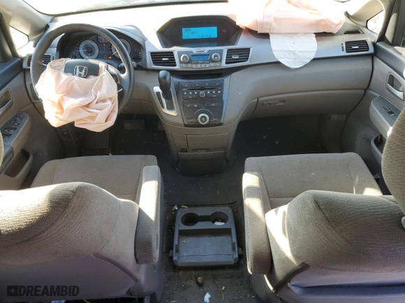 2012 Honda Odyssey LX with VIN 5FNRL5H26CB019627, listed as a Copart auction lot 87094684 with 214,563 mi miles and Salvage Title. Bid and sale history available at carsss.com. Image 8.