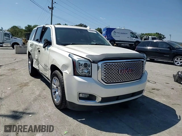 2015 GMC Yukon Denali with VIN 1GKS2CKJ3FR663324, listed as a Copart auction lot 70306614 with 154,234 mi miles and Salvage Title. Bid and sale history available at carsss.com. Image 12.