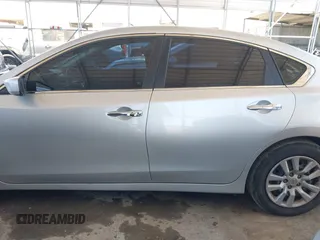 2015 Nissan Altima 2.5 SV with VIN 1N4AL3AP2FC146003, listed as a IAAI auction lot 41657030 with 127,489 mi miles. Bid and sale history available at carsss.com. Image 14.