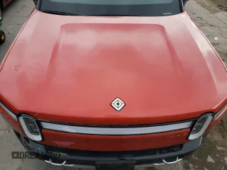 2023 Rivian R1T Adventure with VIN 7FCTGAAA2PN026211, listed as a Copart auction lot 77705414 with Not Provided miles and Salvage Title. Bid and sale history available at DreamBid. Image 11.