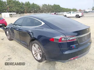 2014 Tesla Model S 60 with VIN 5YJSA1S12EFP42605, listed as a IAAI auction lot 40905031 with 68,155 mi miles and . Bid and sale history available at DreamBid. Image 3.