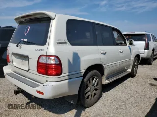 2000 Lexus LX 470 with VIN JT6HT00W2Y0106774, listed as a Copart auction lot 74762004 with Not Provided miles and Salvage Title. Bid and sale history available at DreamBid. Image 3.