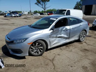 2017 Honda Civic EX z VIN 19XFC2F77HE052231, wystawiony jako Copart lot #56949465 z przebiegiem Nie podano mil oraz Czysty tytuł • Clean title. Historia ofert i sprzedaży dostępna na DreamBid. Obrazek 1.