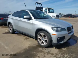 2013 BMW X6 xDrive35i with VIN 5UXFG2C58DL787324, listed as a IAAI auction lot 41670604 with 222,947 mi miles. Bid and sale history available at carsss.com. Image 1.