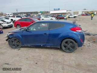 2017 Hyundai Veloster with VIN KMHTC6AD7HU318304, listed as a IAAI auction lot 41726043 with 63,050 mi miles. Bid and sale history available at carsss.com. Image 15.