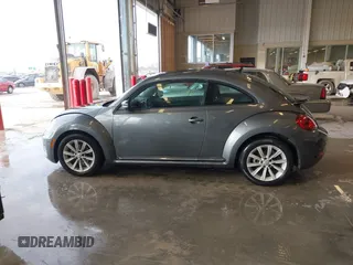 2018 Volkswagen Beetle S with VIN 3VWFD7AT6JM703758, listed as a IAAI auction lot 41381842 with 1 mi miles. Bid and sale history available at carsss.com. Image 14.