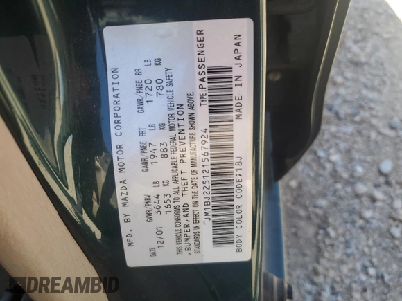 2002 Mazda Protege DX with VIN JM1BJ225121567924, listed as a Copart auction lot 54847545 with 93,653 mi miles and Salvage Title. Bid and sale history available at DreamBid. Image 12.