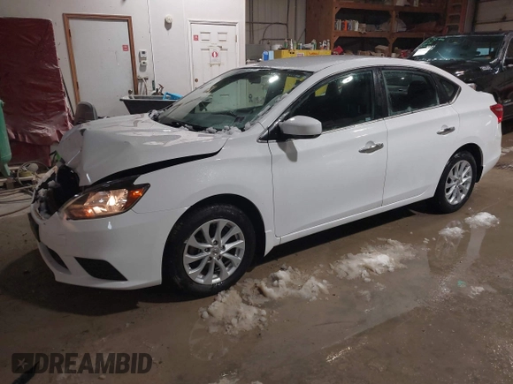 2019 Nissan Sentra S z VIN 3N1AB7APXKY240431, wystawiony jako IAAI lot #41722182 z przebiegiem 81 450 mil mil oraz . Historia ofert i sprzedaży dostępna na DreamBid. Obrazek 17.