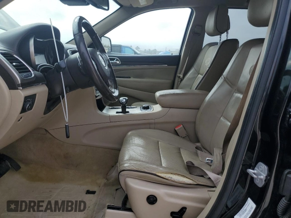 2015 Jeep Grand Cherokee Overland with VIN 1C4RJFCT6FC628729, listed as a Copart auction lot 44979155 with 105,959 mi miles and Salvage Title. Bid and sale history available at DreamBid. Image 7.