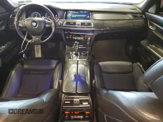 2014 BMW 7 Series ALPINA B7 xDrive with VIN WBAYF8C53ED652566, listed as a Copart auction lot 61177235 with 144,566 mi miles and Salvage title. Bid and sale history available at DreamBid. Image 8.