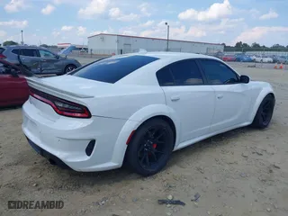 2021 Dodge Charger SRT Hellcat Widebody with VIN 2C3CDXL97MH555067, listed as a IAAI auction lot 40405630 with 19,818 mi miles. Bid and sale history available at carsss.com. Image 4.