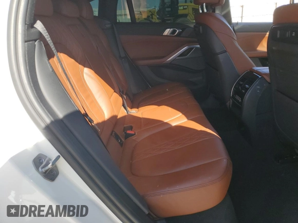 2023 BMW X6 xDrive40i z VIN 5UXCY6C04P9P49005, wystawiony jako Copart lot #51974695 z przebiegiem 30 421 mil mil oraz Szkoda całkowita • Salvage title. Historia ofert i sprzedaży dostępna na DreamBid. Obrazek 11.