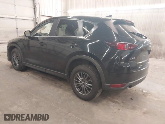 2020 Mazda CX-5 Touring with VIN JM3KFBCM9L1785125, listed as a IAAI auction lot 41983561 with 101,062 mi miles and . Bid and sale history available at carsss.com. Image 3.