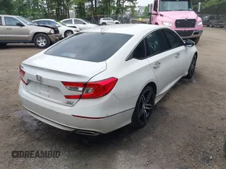 2021 Honda Accord Touring with VIN 1HGCV2F96MA018262, listed as a IAAI auction lot 42498042 with 66,038 mi miles and . Bid and sale history available at DreamBid. Image 4.