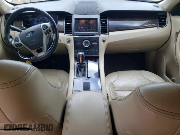 2013 Ford Taurus Limited с VIN 1FAHP2F88DG159651, выставлен на аукционе Copart как лот 55624985 с пробегом 113 878 миль миль и Списание • Salvage title. История ставок и продаж доступна на DreamBid. Изображение 8.