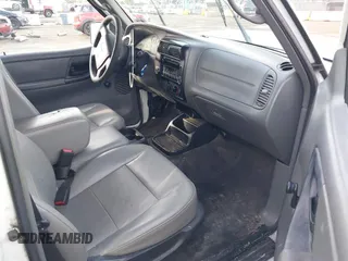 2009 Ford Ranger XL z VIN 1FTYR10DX9PA25560, wystawiony jako IAAI lot #41239225 z przebiegiem 262 920 mil mil oraz . Historia ofert i sprzedaży dostępna na DreamBid. Obrazek 5.