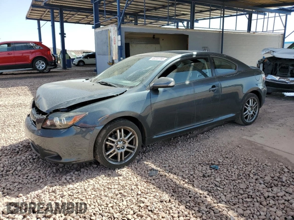 2010 Scion tC with VIN JTKDE3B70A0312506, listed as a Copart auction lot 48233795 with 134,695 mi miles and Salvage Title. Bid and sale history available at carsss.com. Image 1.