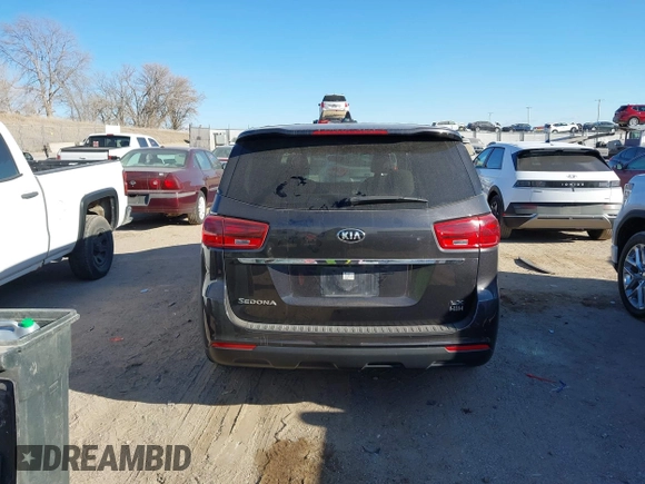2021 Kia Sedona EX with VIN KNDMB5C19M6671229, listed as a IAAI auction lot 41066675 with 168,393 mi miles. Bid and sale history available at carsss.com. Image 16.