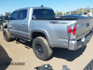 2021 Toyota Tacoma SR5 with VIN 3TMAZ5CN5MM156116, listed as a IAAI auction lot 42017208 with 34,410 mi miles and . Bid and sale history available at DreamBid. Image 3.