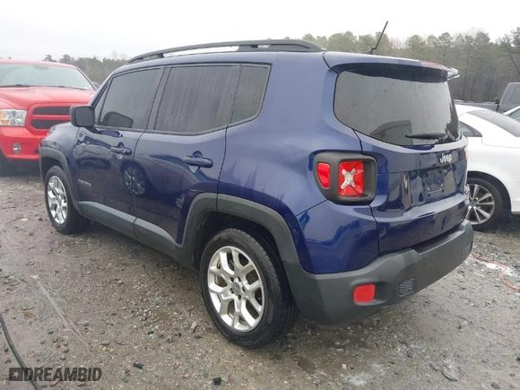 2016 Jeep Renegade Latitude with VIN ZACCJABTXGPE39685, listed as a IAAI auction lot 41564279 with 218,915 mi miles. Bid and sale history available at carsss.com. Image 3.
