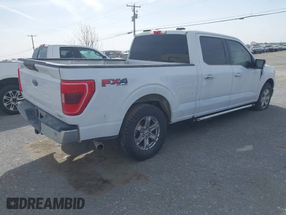 2023 Ford F-150 XL with VIN 1FTFW1E88PKD46695, listed as a IAAI auction lot 41936726 with 156,654 mi miles. Bid and sale history available at carsss.com. Image 4.
